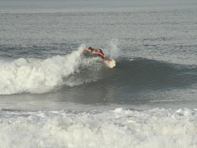 Max Craigie surfing