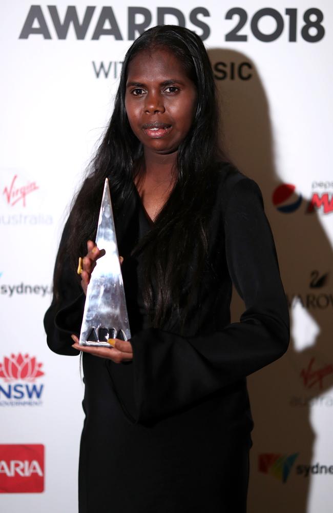 Jasmine Yunupingu  with the ARIA Award for Best Male Artist, which she accepted  behalf of her father Geoffrey Gurrumul Yunupingu. Picture: Getty