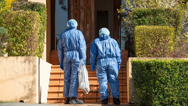 Forensic officers attend the house at Coorparoo where Australian Wallabies rugby union player Toutai Kefu was stabbed in a home invasion. PICTURE: Brad Fleet