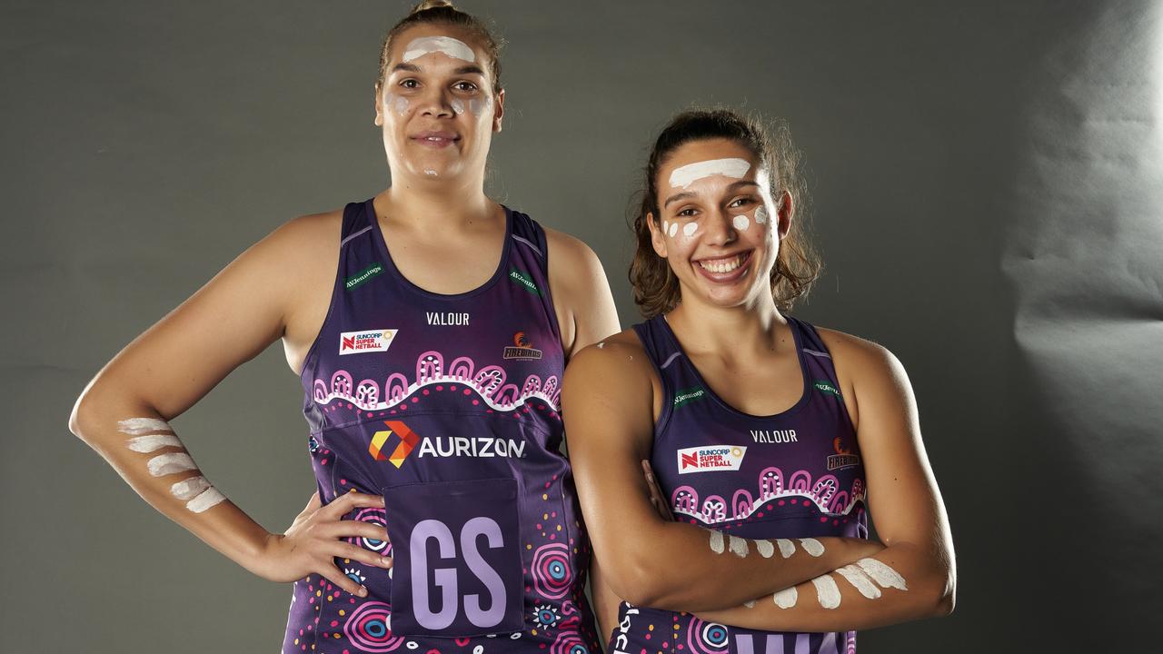 Firebirds Indigenous players Donnell Wallam (left) and Jemma Mi Mi model the club’s First Nations dress. Picture: Queensland Firebirds