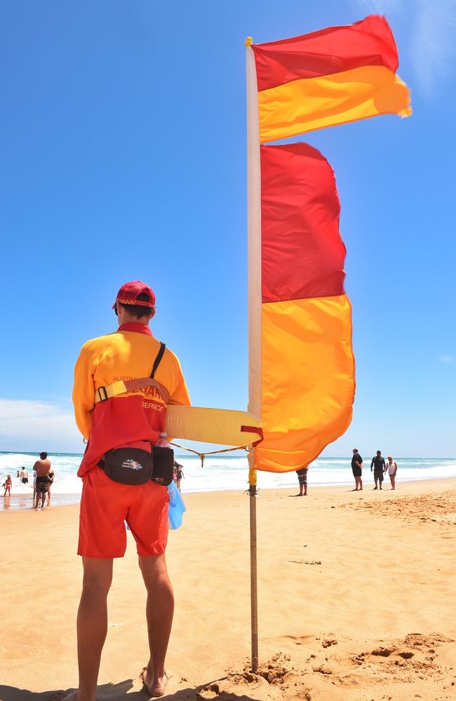 A Lifeguards Victoria staff member watches over swimmers at one of Victoria's most dangerous beaches, Gunnamatta. Picture: Tony Gough