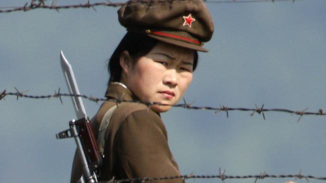 One of the soldiers guarding a North Korean prison camp.