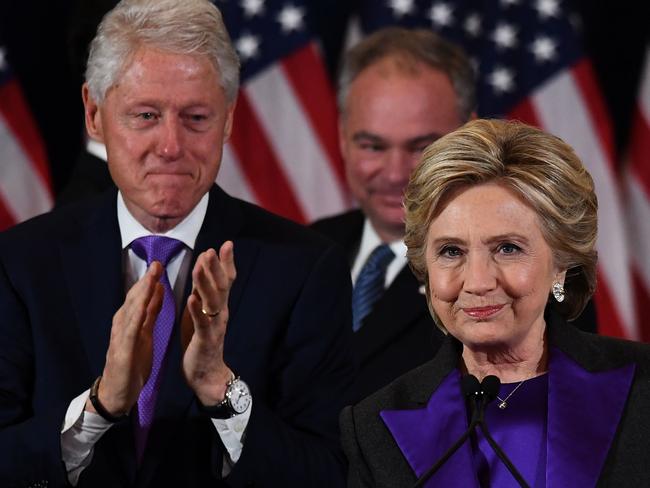 US Democratic presidential candidate Hillary Clinton makes a concession speech after being defeated by Republican president-elect Donald Trump as former President Bill Clinton (L) and running mate Tim Kaine look on in New York. Picture: AFP