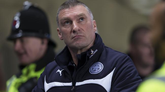 FILE - A Wednesday March 4, 2015 file photo, Leicester's manager Nigel Pearson looks up as he takes to the touchline before his team's English Premier League soccer match between Manchester City and Leicester City at the Etihad Stadium, Manchester, England. Leicester says it has sacked manager Nigel Pearson after the team narrowly avoided relegation from the Premier League last season. The club’s directors said in a statement Tuesday, June 30, 2015 they had “relieved.... Nigel Pearson of his duties” because “fundamental differences in perspective exist between us” and that “the working relationship between Nigel and the Board is no longer viable.” (AP Photo/Jon Super, File)