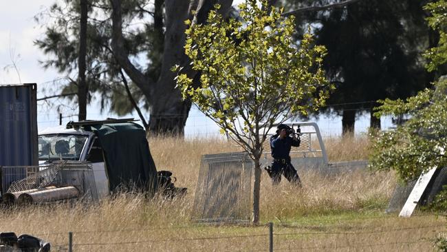 Police at the scene where the bodies were discovered. Picture: NCA NewsWire/Colin Boyd