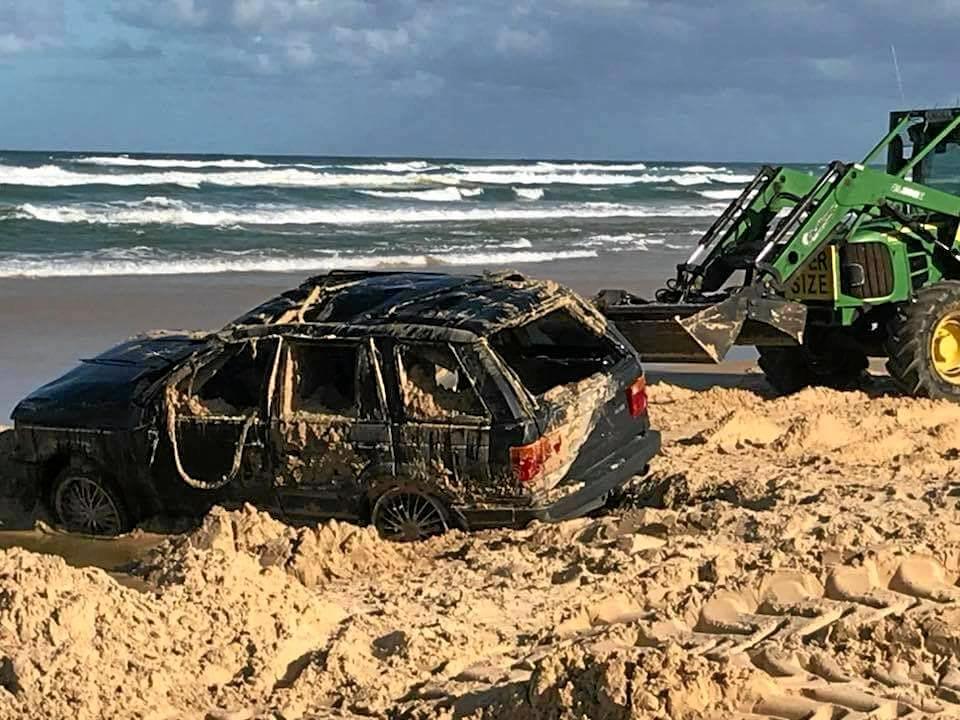 The high tide claimed a Range Rover on Fraser Island. These photos were posted to the I Got Bogged at Inskip Point Facebook page.