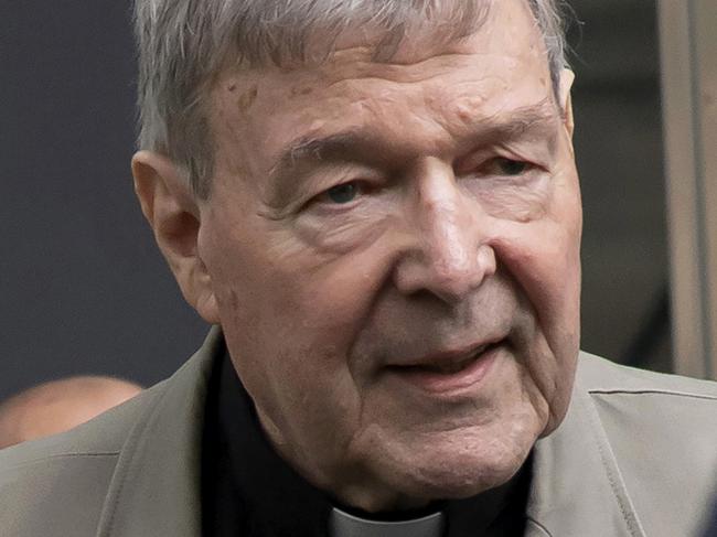 FILE - In this Feb. 26, 2019, file photo, Cardinal George Pell arrives at the County Court in Melbourne, Australia. Pell, the most senior Catholic to be found guilty of sexually abusing children, will learn whether Australia's highest court will hear his appeal against convictions for molesting two choirboys in a Melbourne cathedral two decades ago. (AP Photo/Andy Brownbill, File)