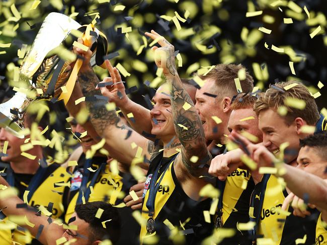 *APAC Sports Pictures of the Week - 2019, September 30* MELBOURNE, AUSTRALIA - SEPTEMBER 28: Dustin Martin of the Tigers holds aloft the Premiership Trophy after victory in the 2019 AFL Grand Final match between the Richmond Tigers and the Greater Western Sydney Giants at Melbourne Cricket Ground on September 28, 2019 in Melbourne, Australia. (Photo by Mark Metcalfe/AFL Photos/via Getty Images )