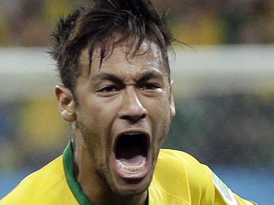 Brazil's Neymar celebrates after scoring his sides first goal during the group A World Cup soccer match between Brazil and Croatia, the opening game of the tournament, in the Itaquerao Stadium in Sao Paulo, Brazil, Thursday, June 12, 2014. (AP Photo/Felipe Dana)