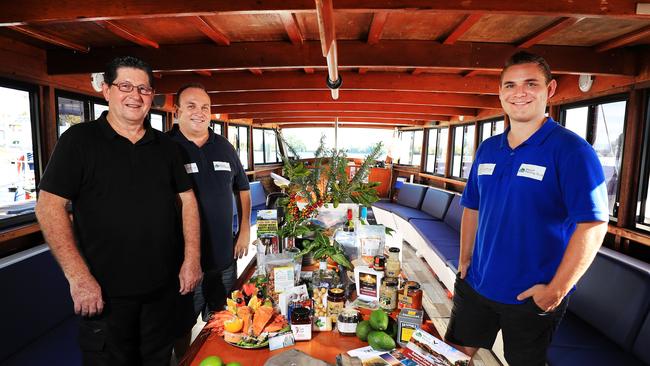 Launching the Taste Tweed Farm Tour in a Box,an innovative new virtual tour which incorporates farm visits and interviews of farmers and business owners plus actual products and produce to sample are Allan's Seafood and Asian Restaurant owneer Allan Singleton, Mount Warning Tours' Michael SImmons and video producer Ryan Fowler.Photo: SCOTT POWICK