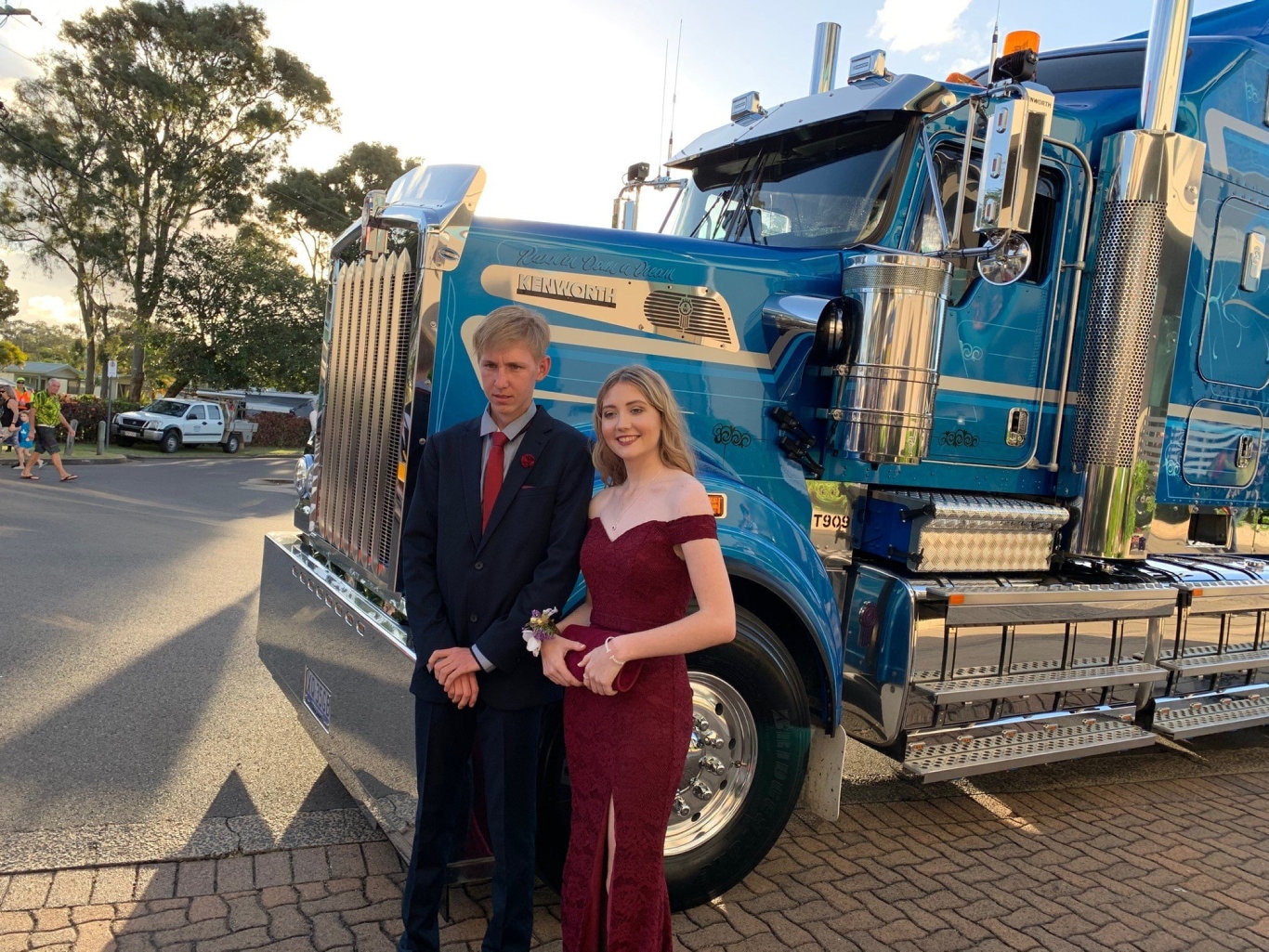 Erin O'Brien and Declan Parker arrive at the Fraser Coast Anglican College formal in style in a semi-trailer.