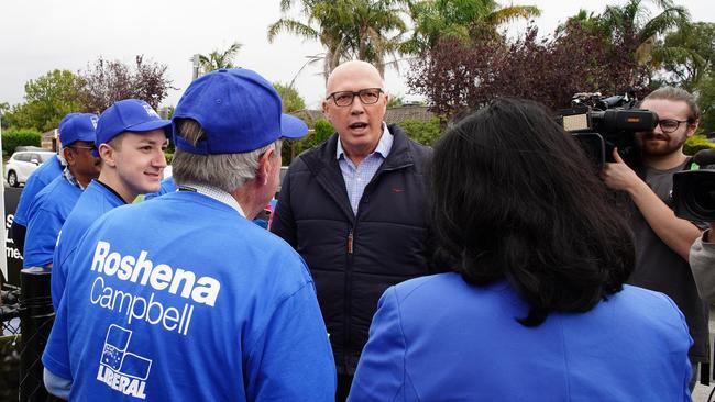 Peter Dutton and the Liberal Party candidate for Aston Roshena Campbell are seen in Lysterfield Primary School on by-election day. Picture: NCA NewsWire / Luis Ascui