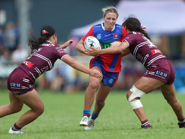 Danii Nicole Gray (left) making a tackle. Picture: Sue Graham