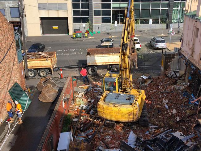 Nearby residents snapped this picture as they watched the pub get knocked down. Picture: Supplied