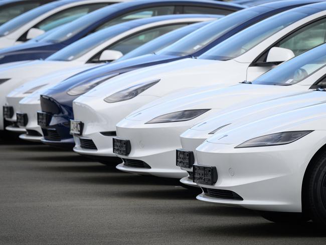 Rows of new Tesla cars are seen in a holding area near a customer collection point. Picture: Leon Neal/Getty Images
