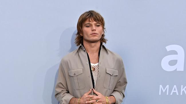 Australian model Jordan Barrett arrives to attend the Cinema Against AIDS gala at the Villa Eilenroc. (Photo by John MACDOUGALL / AFP)