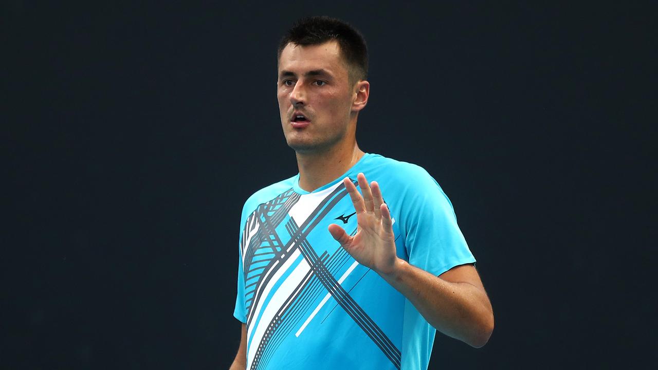 Tomic has a reputation for tanking. (Photo by Mike Owen/Getty Images)