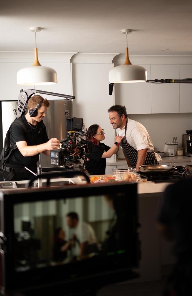 Bus Stop Films Celebrity Ambassador Miguel Maestre on set with participant Ashley Kuhle and cinematographer Mikey Hamer. Picture: Supplied