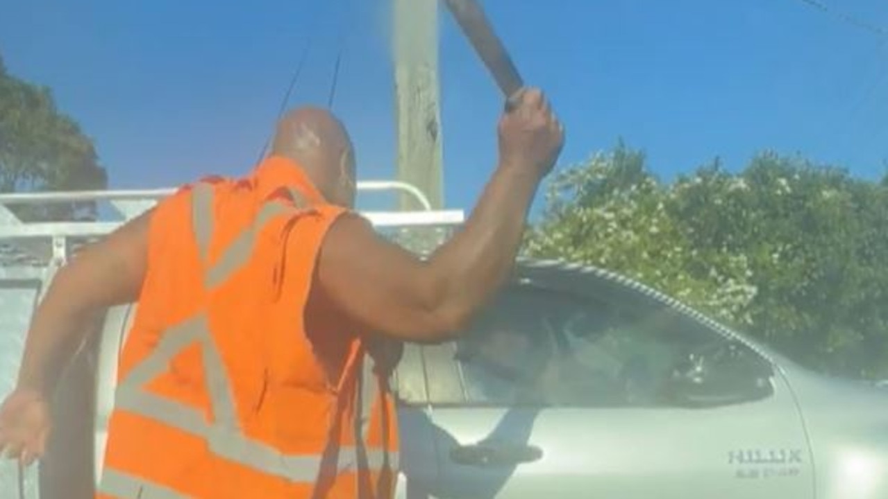 Man smashes ute with machete in road rage