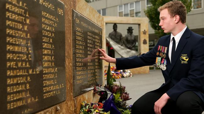 Mitchell Price at <a contentType="text" href="http://www.dailytelegraph.com.au/newslocal/news/penrith-to-honour-the-fallen-with-a-giant-poppy-park-to-commemorate-anzac-day-in-2015/news-story/37bbccb16753eda9ccfc2419e5f67f70" shape="rect" target="_blank">Memory Park</a>, Penrith, after winning the Premier's award. Mitchell is wearing his grandfather and great grandfathers medals. Picture: Justin Sanson.