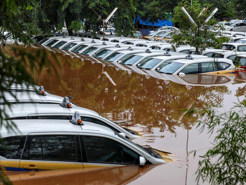 A fleet of flooded taxis in Jakarta on January 1, 2020. Picture: Ralia/AFP