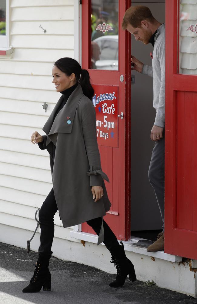 Meghan leads the way as she and Prince Harry exit brunch for the next stage of the tout. Picture: Kirsty Wigglesworth/Getty