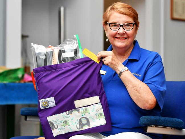 President of Soroptimist International Townsville Breakwater Janet Askern,  with prison made library bags for kids.  Picture: Alix Sweeney