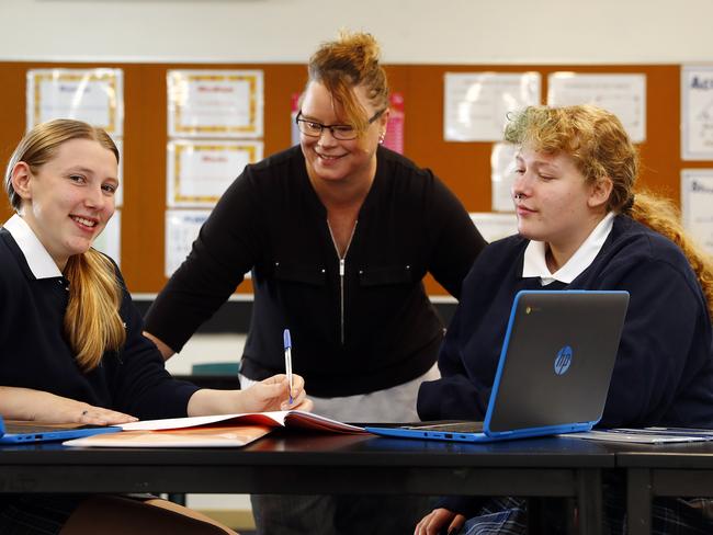 Chifley College in Mt Druitt students Hayley Vaughn and Taryne Azzopardi with teacher Nikki Beaton Picture: Sam Ruttyn