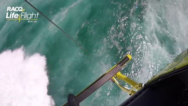 Stunning helicopter rescue from seven-foot surf