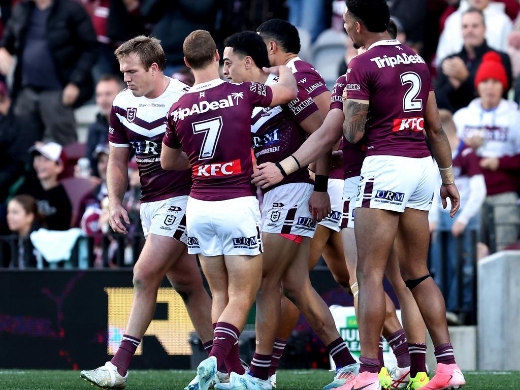 Lehi Hopoate celebrates his try with his teammates. Picture: Brendon Thorne/Getty Images