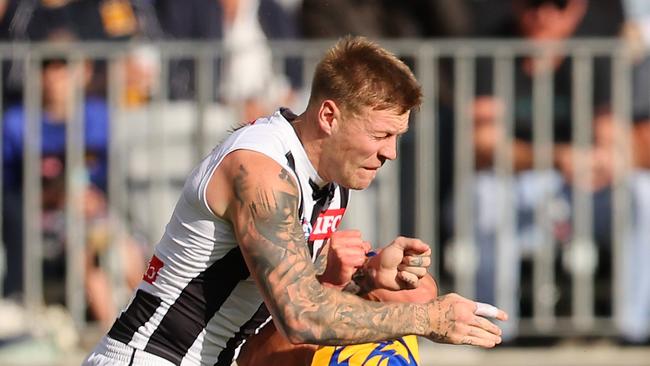 PERTH, AUSTRALIA – JUNE 03: Jordan De Goey of the Magpies bumps Elijah Hewett of the Eagles during the round 12 AFL match between West Coast Eagles and Collingwood Magpies at Optus Stadium, on June 03, 2023, in Perth, Australia. (Photo by Paul Kane/Getty Images)