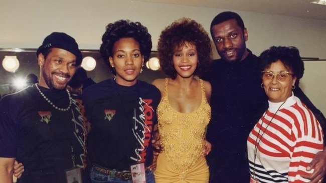 Whitney Houston and Robyn Crawford (both centre) in a candid backstage snap.