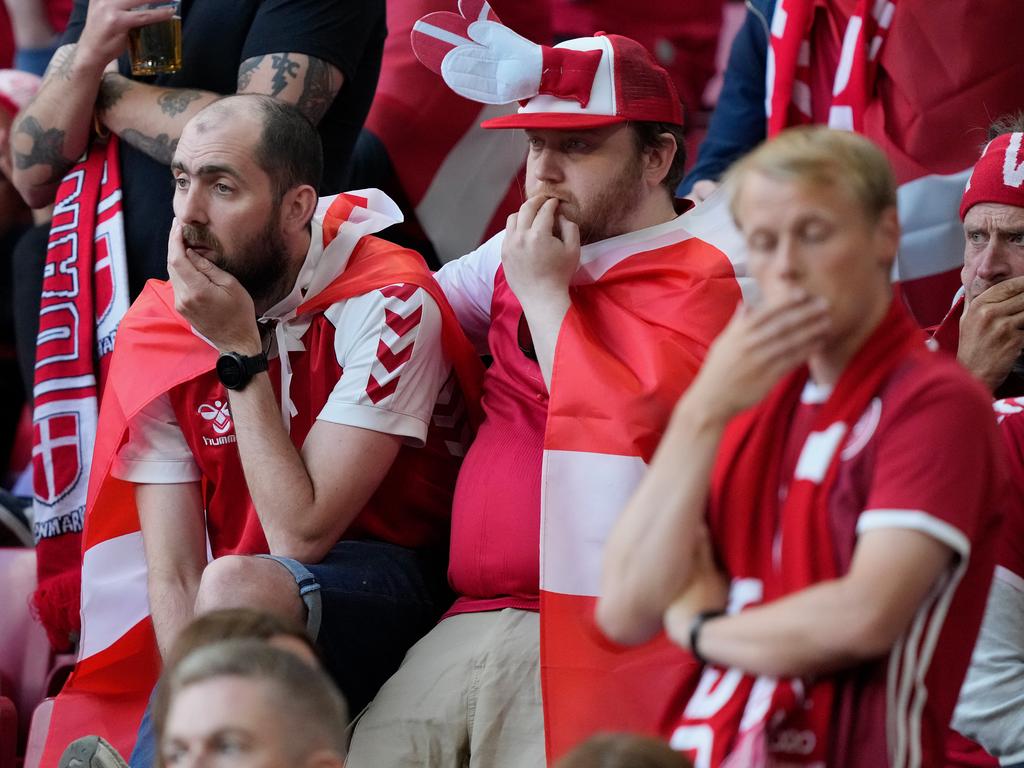 Denmark fans look on.