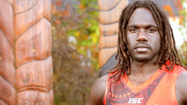 Essendon fans get out of their seats when Anthony McDonald-Tipungwuti goes near the footy. Picture: Mark Wilson