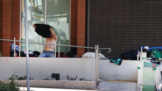 A homeless person outside the Anglican Church at Southport. Picture: Glenn Hampson