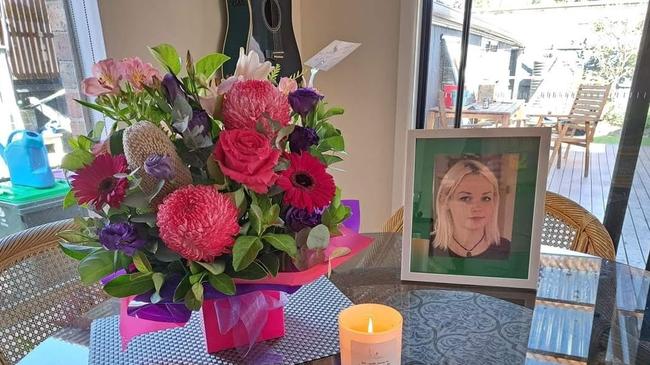 A floral tribute for Amy by her father. Pictures: Supplied