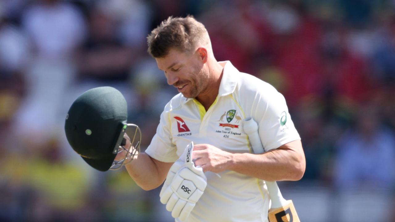 David Warner of Australia leaves the field after being dismissed by Stuart Broad