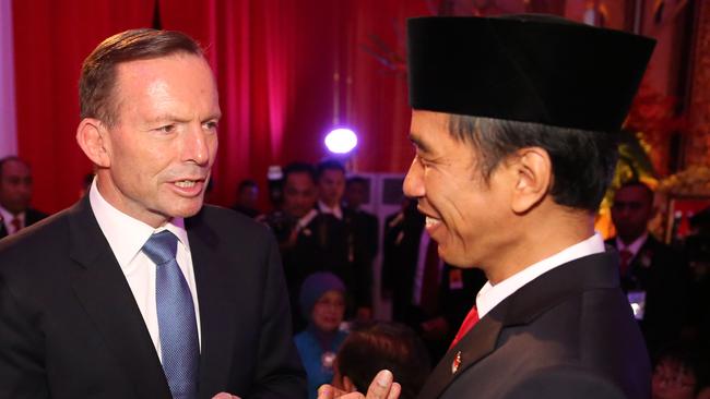 Prime Minister Tony Abbott and new Indonesian President Joko Widodo at the President’s inauguration yesterday.