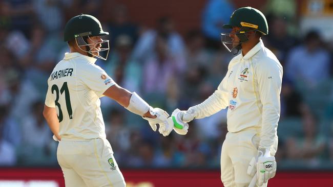 David Warner and Usman Khawaja bat together at Adelaide Oval. Picture: Chris Hyde/Getty Images