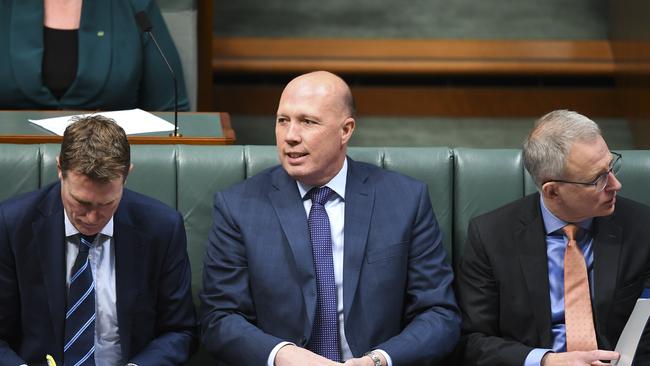 Australian Home Affairs Minister Peter Dutton reacts during House of Representatives Question Time at Parliament House in Canberra, Monday, 22 July, 2019. (AAP Image/Lukas Coch)