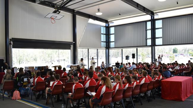 Foundation students, parents and staff of Sophia College Plainland celebrate the first day of school at the brand new campus. Photo: Hugh Suffell.