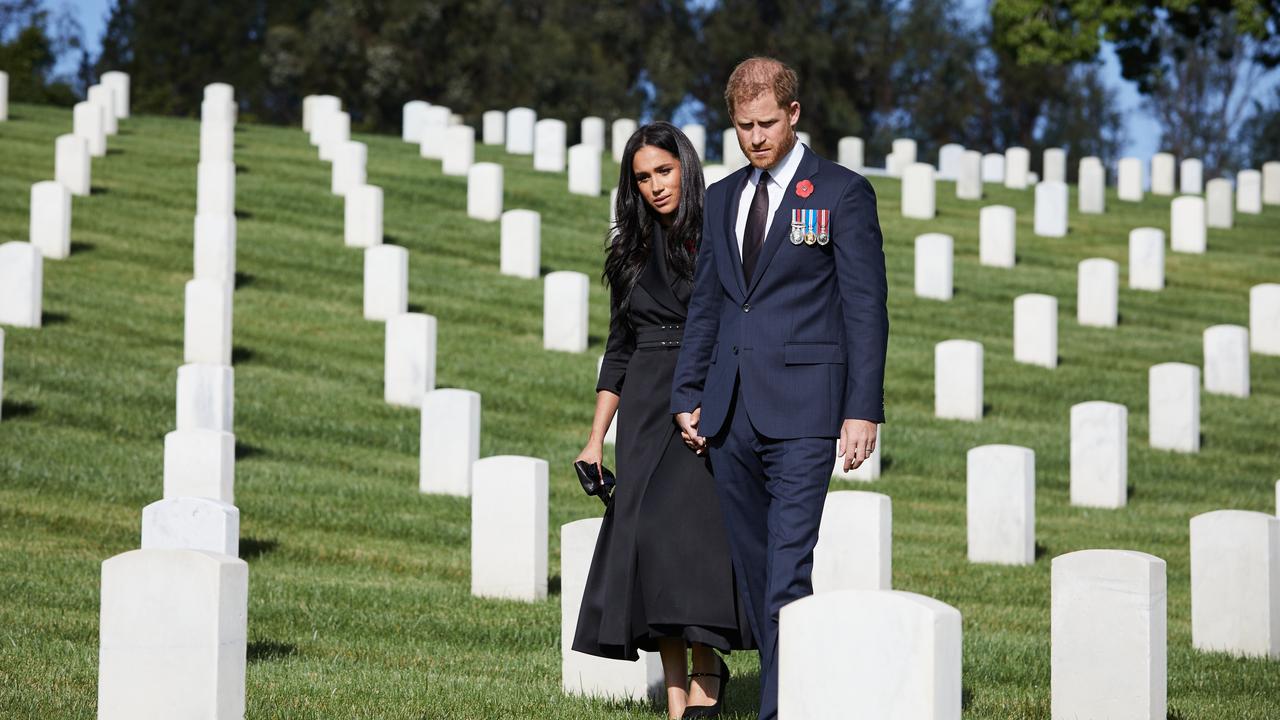 Meghan and Harry brought along their own photographer as they paid respect on Remembrance Day. Picture: Lee Morgan/Handout via Getty Images.