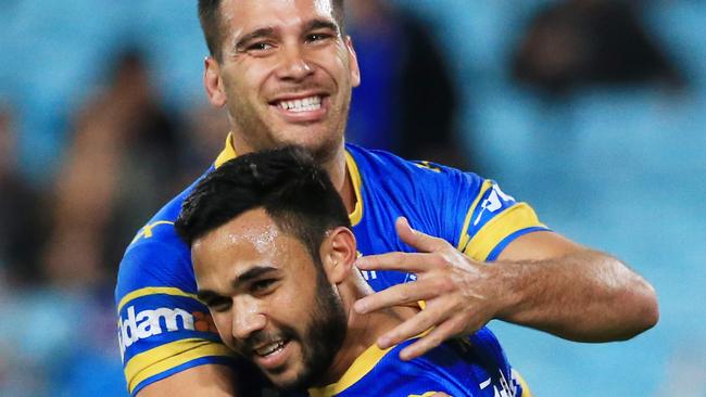 Bevan French celebrates a try with Corey Norman. Picture: Mark Evans
