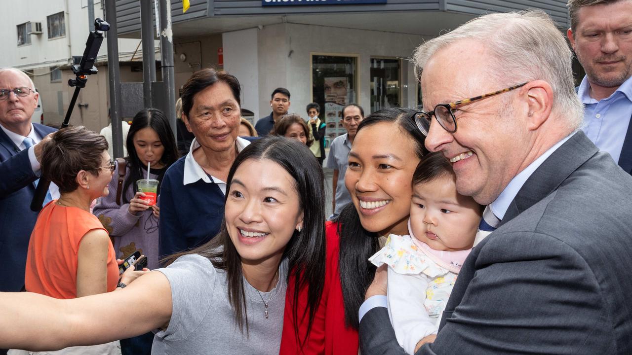 Mr Albanese and Ms Le were besieged by locals for selfies during the street walk in Fowler on Monday. Picture: Jason Edwards / NewsWire