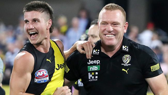 Richmond's Liam Baker and Justin Leppitsch after the 2020 AFL Grand Final.