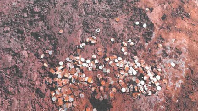 One of only two photos that exist of "hoard a" in situ, on the day they were discovered.