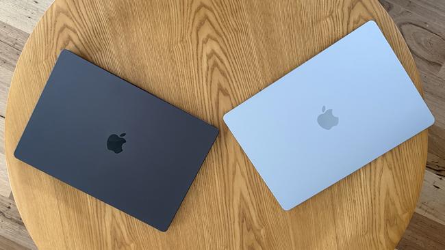 The new MacBook Air 15-inch in Sky Blue beside the MacBook Pro 16-inch in Space Black.