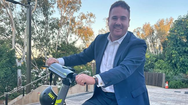 Superpedestrian Asia Pacific regional director Mitchell Price rides a LINK e-scooter. The company is pitching to bring its e-scooters to Australia with a new system that will rate riders for safety.