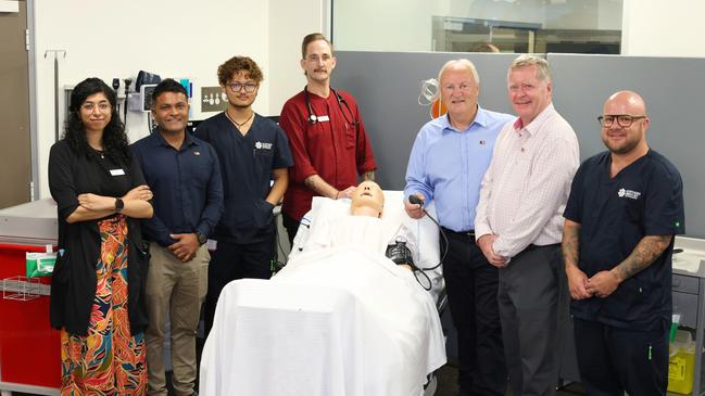 Dr Amel Safi, Khoda Patel, Member for Casuarina, graduate nurse Mushahid Fatemi, Dr Gabriel Jackson, Minister for Health Steve Edgington, Brian O'Gallagher Member for Karama and graduate nurse Hayden Sandrey, at Royal Darwin Hospital on January 29, 2025.