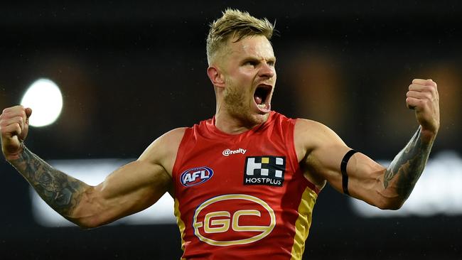 APAC Sports Pictures of the Week - 2020, July 27 - GOLD COAST, AUSTRALIA - JULY 23: Brandon Ellis of Gold Coast Suns  celebrates kicking a goal during the round 8 AFL match between the Gold Coast Suns and Western Bulldogs at Metricon Stadium on July 23, 2020 in Gold Coast, Australia. (Photo by Matt Roberts/AFL Photos/via Getty Images)